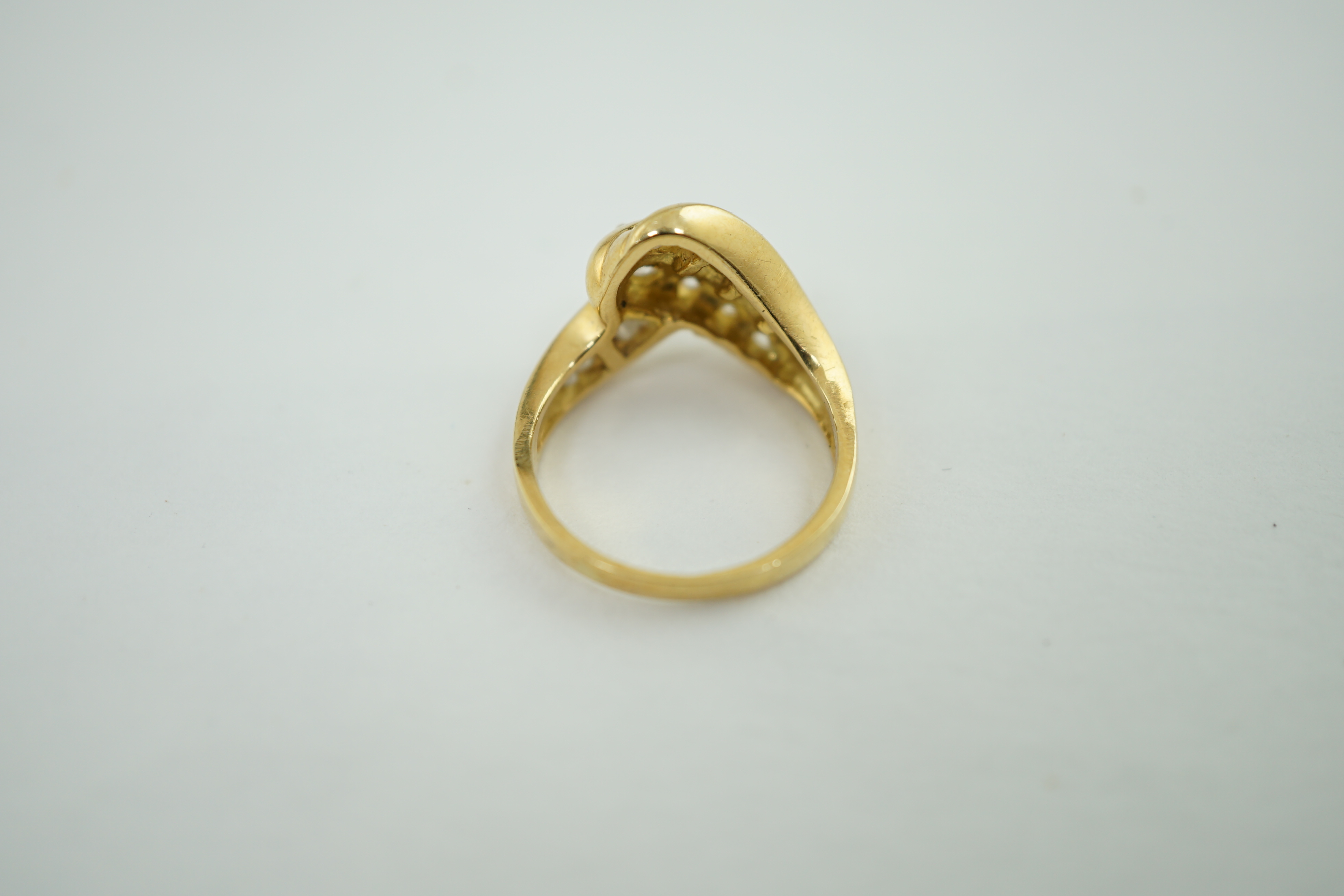 An 18k gold and diamond dress ring